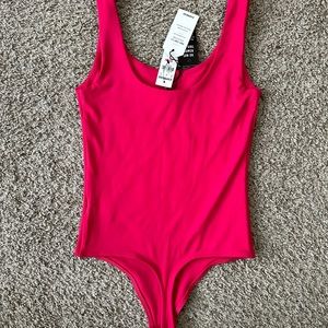 Pink bodysuit